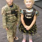 Austin Pilcher, 6, and his younger sister Sara, 4, show off their costumes during the City of Kirkland&rsquo;s Halloween Costume Swap Saturday. Megan Campbell/Kirkland Reporter