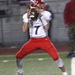 Juanita&rsquo;s Jake Hohu drops back to pass against Lake Washington. Courtesy of Shannon Soleil Rene