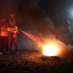 Matt Brown puts out a fire during a CERT training course in Kirkland. Megan Campbell/Kirkland Reporter
