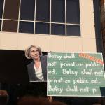 Signs used an educational theme to ridicule DeVos for her policies. Nicole Jennings/staff photo