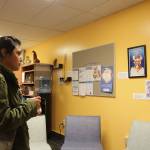 Araceli Laborin checks out the art in Lake Washington Institute of Technology&rsquo;s new RISE Center. Samantha Pak, Kirkland Reporter