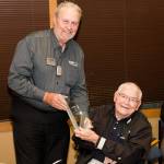 AARP Washingtons volunteer president Mike Tucker (left) presents Kirkland resident Art Mussman with the 2017 AARP Washington Andrus Award for Community Service. Courtesy photo