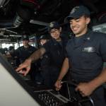 Boatswains Mate 2nd Class Thomas Vongpanya (left) of Kirkland and Boatswains Mate 3rd Class Oscar Joiner (right) of Mossspoint, Mississippi stand watch on the bridge of the USS Pearl Harbor. Logan C. Kellums, U.S. Navy