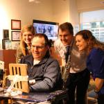 From left, Kristi Herriott, Gary Fisher, Ted Brown and Julia Irwin smile for a selfie using the Sesame Enable app on Fishers device. Samantha Pak, Kirkland Reporter