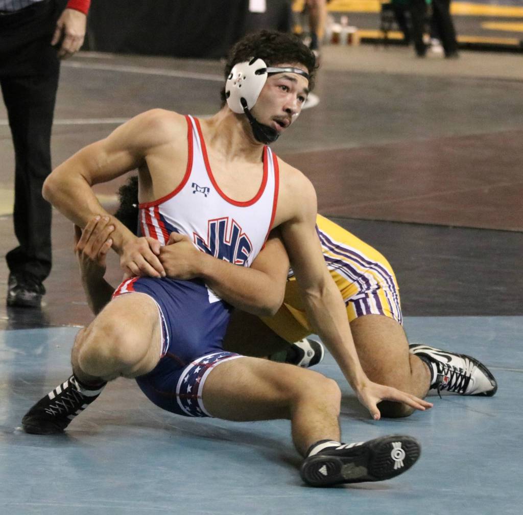 Juanitas Matthew Moehrle competes at state at the Tacoma Dome. Andy Nystrom, Reporter