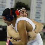 John Nascimento wraps up Josiah Vaiolo. Andy Nystrom, Reporter