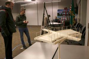 Community members review the current designs of the Totem Lake Connector Bridge and the proposed plank overlook that will offer a unique view of Totem Lake. Kailan Manandic, Kirkland Reporter
