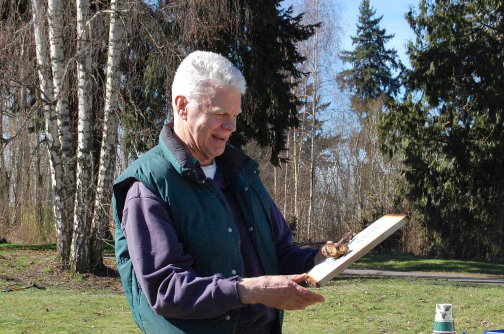 Dave Ramsay admires a plaque recognizing his restoration efforts. I got a lot of plaques in my day, but this tops them all, he said. Katie Metzger/staff photo