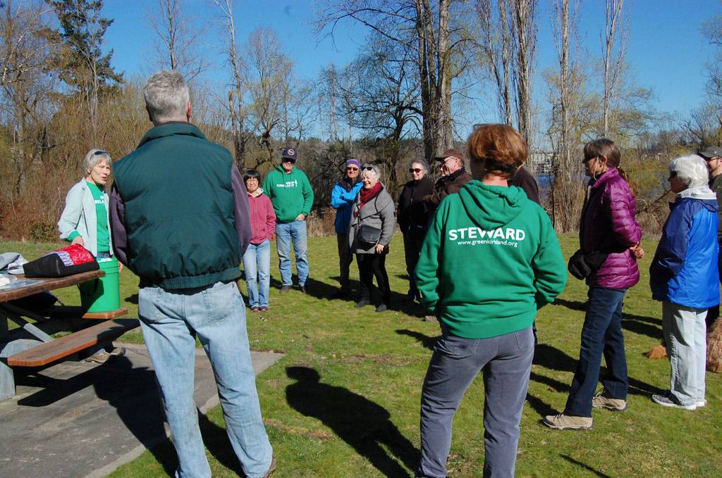 Dave Ramsays volunteer work group gathers in Juanita Bay Park to wish him well in his move to Seattle. Katie Metzger/staff photo