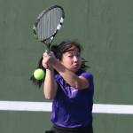 Lake Washingtons No. 1 singles player Charlize Yeh controls the ball against Juanita. Andy Nystrom / staff photo