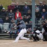Lake Washingtons Michael Buchanan slugs the game-winning homer in last Fridays 2-0 win over Juanita. Photo courtesy of Corky Trewin