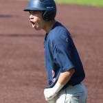 Juanitas Austin Santiago gets fired up on first base after nailing an RBI single in the first inning. Andy Nystrom / staff photo