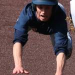 Juanitas Adam Petter dives back to first base. Andy Nystrom / staff photo
