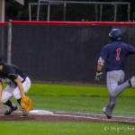 Photo courtesy of Don Borin/Stop Action Photography                                Juanita Rebels junior Taylor Peterson hustles to first base in the top of the third inning against the Mercer Island Islanders in the Class 3A KingCo championship game. Peterson was safe at first after an errant throw by Mercer Islands third baseman. Mercer Island defeated Juanita 11-1 in the contest on May 5 at Bannerwood Park in Bellevue.