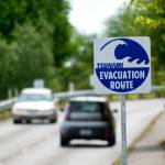 Vehicles travel on West Second Street in Port Angeles along a tsunami evacuation route Tuesday. (Jesse Major/Peninsula Daily News)