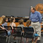 Kirkland City Council member Dave Asher talks to the girls proposing a plastic bag ban before the May 15 meeting. Katie Metzger/staff photo