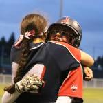 Juanitas Lexi Blackburn, left, embraces Megan Murray after her game-winning hit. Murrays walkoff single gave the Rebels a 5-4 win over West Seattle on May 17. Andy Nystrom / staff photo