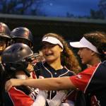 Juanita softball players celebrate their win. Andy Nystrom / staff photo