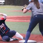 Juanitas Jordan Schroeder slides into third following her two-RBI triple. Andy Nystrom / staff photo
