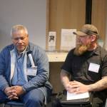 James, left, speaks about his time living in homelessness with his case manager Greg McLeod from Attain Housing. Evan Pappas/Staff Photo