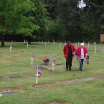 Volunteers Tom and Janet Brown, of Kirkland, wanted to honor local veterans for Memorial Day. Katie Metzger/staff photo