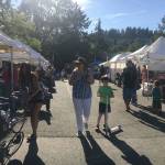 Shoppers enjoy the Juanita Friday Market on July 13. Katie Metzger/staff photo