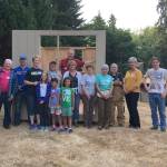 Cal Pygott (in back) smiles with some volunteers who helped him build a tiny home to house a homeless person. Photo courtesy of Holy Spirit Lutheran Church
