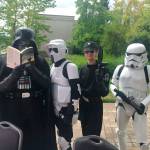 Darth Vader reads Spare Parts, the book selected for the inaugural KirklandReads program, at Summerfest on Aug. 11. Katie Metzger/staff photo