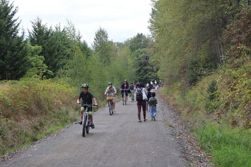 Families walk and bike along the Cross Kirkland Corridor during Crossing Kirkland on Sept. 8. Katie Metzger
