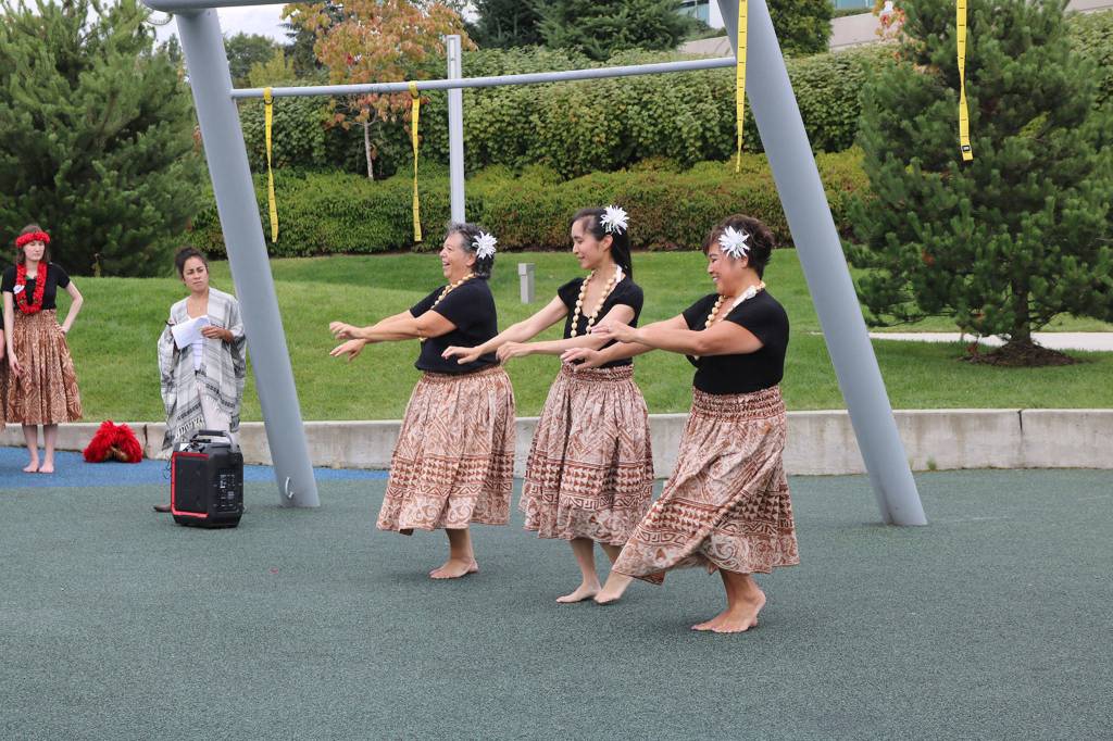 A performance by Hula Halau O Makanaokalani entertains the audience at Crossing Kirkland. Katie Metzger/staff photo