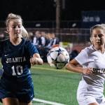 Juanita senior Allyson Ingersoll, left, and Bellevue freshman midfielder Kendall Serres, right, battle for possession of the ball. The Rebels defeated the Wolverines 1-0 on Sept. 27 at Juanita High School in Kirkland. Photo courtesy of Stephanie Ault Justus