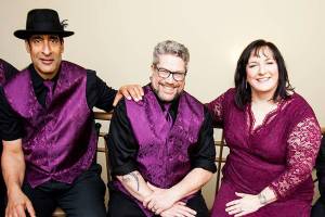 Michele DAmour and the Love Dealers stay at No. 1 on Roots Music Reports blues chart. From left: Brian Olendorf, Noel Barnes, Patrick McDanel, Michele DAmour, Dave Delzotto and Jeff Cornell. Photo courtesy of Michele DAmour.