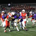 Lake Washington and Juanita players battle on the gridiron. Photo courtesy of Shannon Soleil Rene