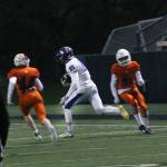 Lake Washingtons Evan Liggett rolls up field after making a catch. Photo courtesy of Shannon Soleil Rene