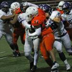 The Kang defense puts the clamps on an Eastside Catholic foe. Photo courtesy of Shannon Soleil Rene