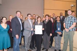 The Council recognized the AFIS program as it celebrates 30 years of assisting law enforcement throughout King County. Councilmembers, AFIS staff and King County Sheriff Mitzi Johanknecht join AFIS regional manager, Carol Gillespie. Photo courtesy of King County.