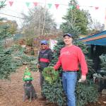 Carmelo Ramirez (left) and owner, Mike Wehrle receive customers in their Kirkland lot on 1006 Lake St. S . Stephanie Quiroz/staff photo