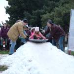 Kirklands Josefina Shore, 5, gets a push down the sledding hill at Kirklands Winterfest. The snow slide was sponsored by Life Community Church. Katie Metzger/staff photo
