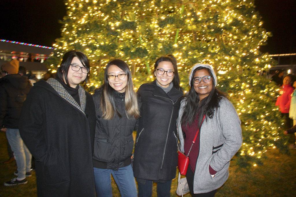 L-R: Google employee Lisa Yin enjoys the light show with friends Victoria Duan, Mylinh Pham, Stuti Sulgaonkar. Stephanie Quiroz/staff photo.