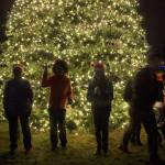 Families enjoyed taking pictures by the Christmas tree on Dec. 7. Stephanie Quiroz/staff photo.