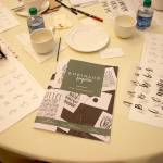 The workshop provided paper materials, pens, ink, and a Brush Lettering 101 booklet, as well as bites and hot cider from Trellis Restaurant. Stephanie Quiroz/staff photo