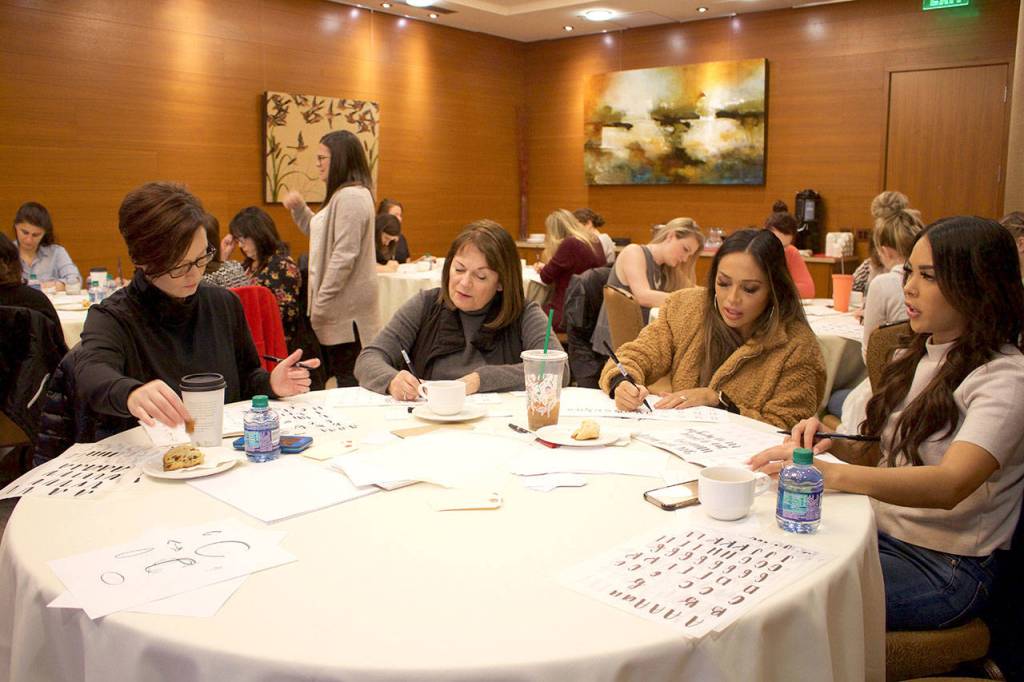 L-R: Amber Bulluck, Stephanie Reimer, Pilita Corrales and Blythe Condo enjoyed learning at their first hand lettering class. Stephanie Quiroz/staff photo
