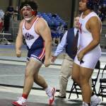 Juanita Highs John Nascimento celebrates his wrestling title while opponent Josiah Vaiolo looks on. Andy Nystrom / staff photo