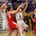 Lake Washington and Juanita players battle for the ball in a 2A/3A KingCo girls basketball first-place showdown on Jan. 9. LW won, 43-36, and leads the league with a 5-1 record while Juanita is tied for second with Bellevue at 4-2. For LW, Rosa Smith had 13 points and Jen Estes had 10 points. Andy Nystrom / staff photo