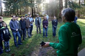 Green Kirkland and University of Washington students supervise local volunteers and demonstrate how to properly and completely remove invasive plants. Kailan Manandic/staff photo