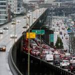 Southbound traffic backs up as northbound drivers cruise on with ease on the State Route 99 viaduct three days before its closure. Andy Bronson/The Herald
