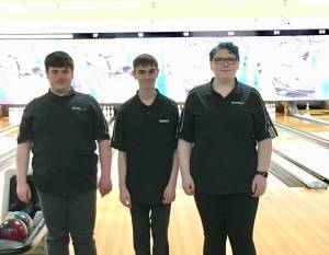 Inglemoor Highs Gregory Pinget, left, and Nathan Takacs and Juanita Highs Madeline Sage at the recent state bowling championships. Courtesy photo