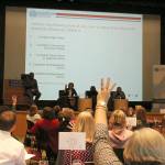 Panel luncheon audience members predict survey results in regard to what Eastsiders consider to make up the American Dream. From left: James Whitfield, Dr. Amy Morrison, Anne Morisseau and Anne-Marie Diouf. Madison Miller / staff photo