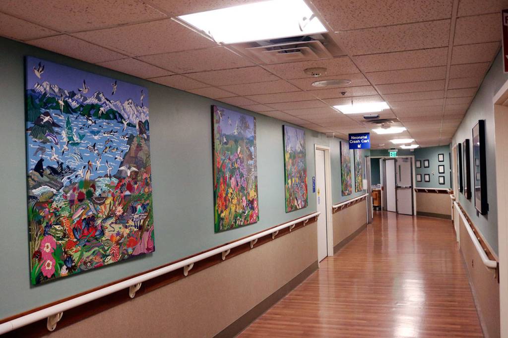 The hallways of EvergreenHealths Family Maternity Center feature designs and art that was put in over two decades ago. Officials hope the modernization will better serve laboring mothers and their families. Kailan Manandic/staff photo