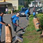 Landscaping work included weeding and replanting the campus flower beds. Photo courtesy of Comcast NBCUniversal